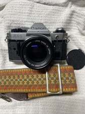 Vintage Canon AE-1 Program 35mm SLR Film Camera FD 50mm F/1.4 WORKS NEW BATTERY
