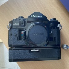 Canon A-1 A1 35mm SLR Film Camera w/ 50mm FD lens Kit not tested chipped plastic