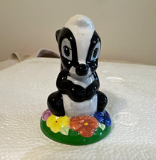 Disney Skunk Figurine Black & White on Flower Floral Base, 3-4.9"
